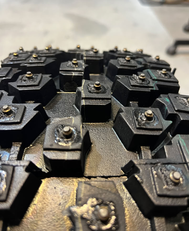 Close-up of a tire tread with 4.5mm studs on MS15 design tyres.